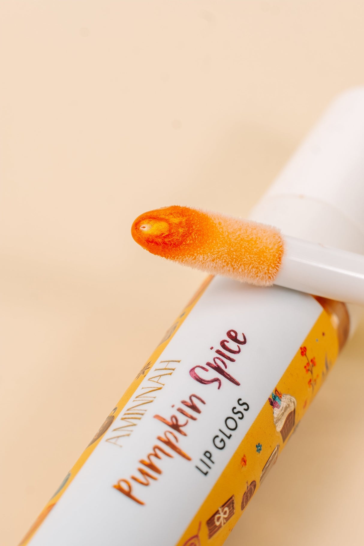 Pumpkin Spice Lip Gloss by AMINNAH