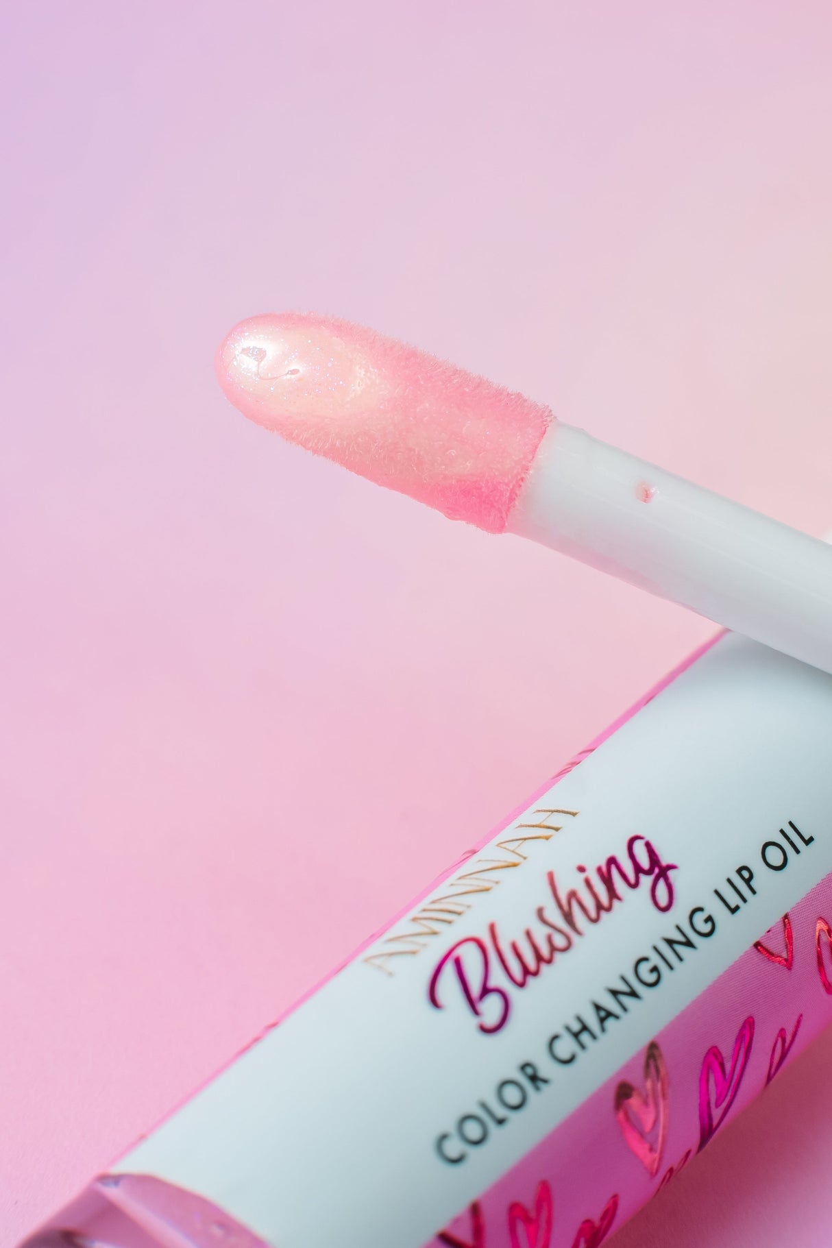 Blushing Color Changing Lip Oil by AMINNAH