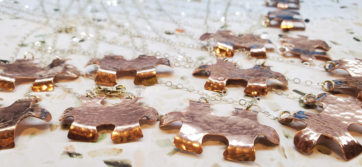 Handmade Hammered Copper Puzzle Piece Necklace by Alexa Martha Designs