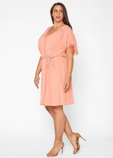 Plus Size Lace Trim Wrap Dress in Coral by Shop at Konus