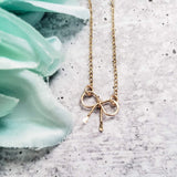 Dainty Bow Necklace by Salt and Sparkle