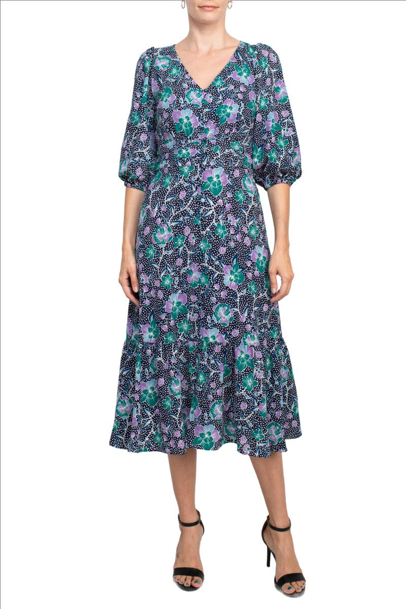 Maggy London V-Neck 3/4 Sleeve Elastic Cuff’s Pleated Faux Button Front Zipper Back Flutter Hem Floral Print Crepe Dress by Curated Brands