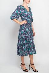 Maggy London V-Neck 3/4 Sleeve Elastic Cuff’s Pleated Faux Button Front Zipper Back Flutter Hem Floral Print Crepe Dress by Curated Brands