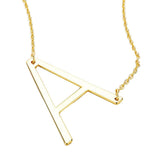 A Monogram Metal Pendant Necklace by Madeline Love