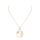 Metal Cut Out Ribbon Heart Lock Pendant Necklace by Madeline Love