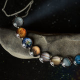 Curved Solar System Necklace in Silver by Yugen Handmade