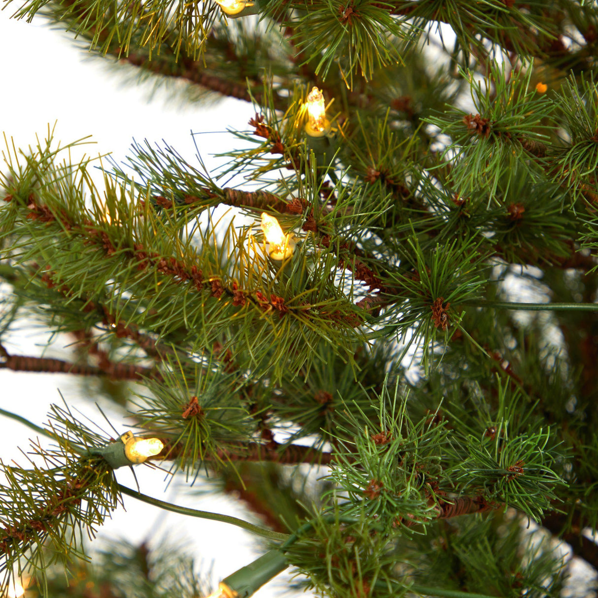 52” Vancouver Mountain Pine Artificial Christmas Tree with 100 Clear Lights and 374 Bendable Branches in Bronze Metal Planter by Nearly Natural