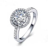 White Gold Halo Round Cut Cubic Zirconia Ring by Hollywood Sensation®