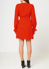 Smocked Bell Sleeve Wrap Dress in Red by Shop at Konus