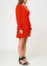 Smocked Bell Sleeve Wrap Dress in Red by Shop at Konus