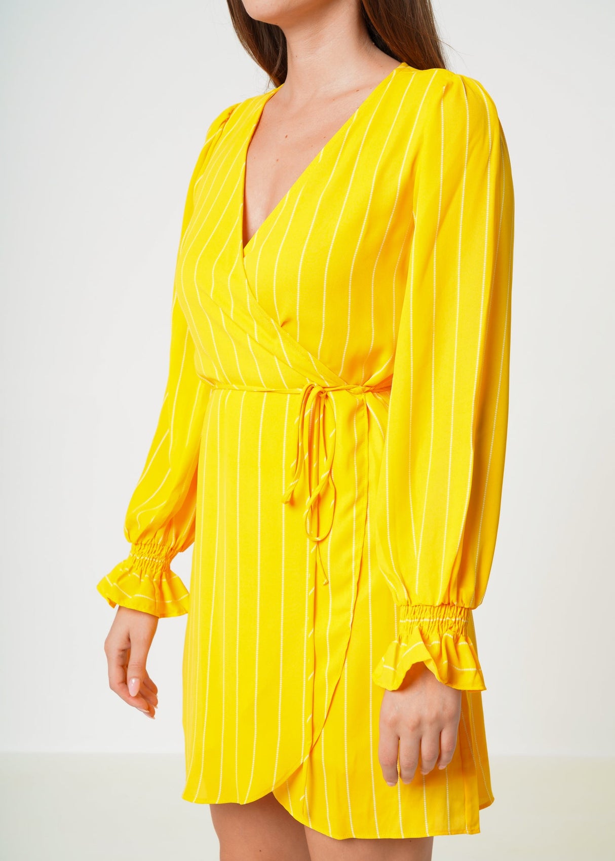 Smocked Bell Sleeve Wrap Dress in Yellow by Shop at Konus